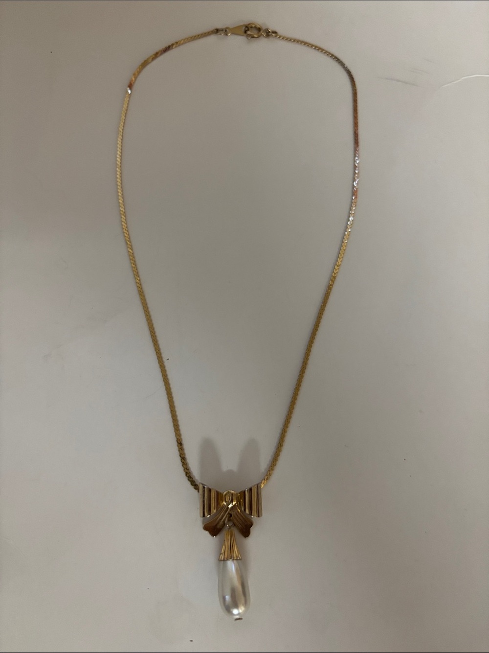 Gold Bow Pendant Necklace with Teardrop Pearl - Women's Jewelry
